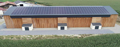 Aerial photo of a building with Base's photo-voltaic panels