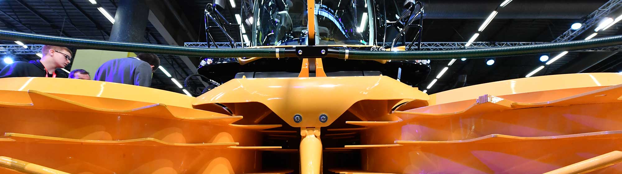 Front of a yellow agricultural machine