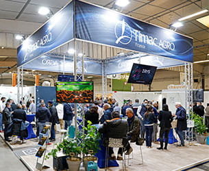 Visitors in front of the Tima Agro booth